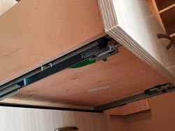 Hidden, under-drawer slides