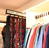 white custom closet with cabinet drawers